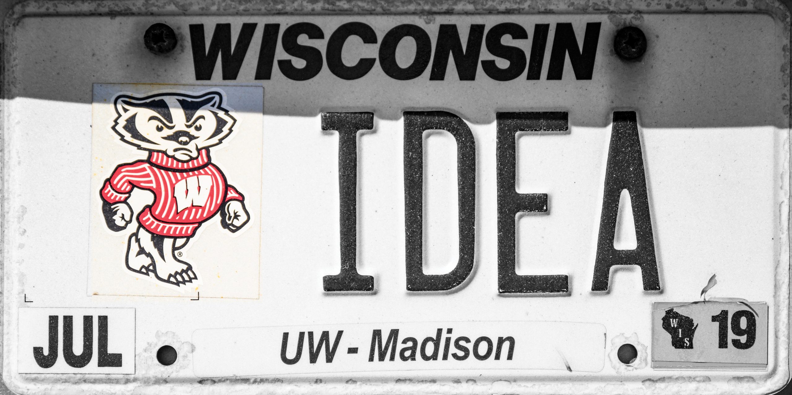 Wisconsin license plate with the text "IDEA" and the University of Wisconsin-Madison badger mascot